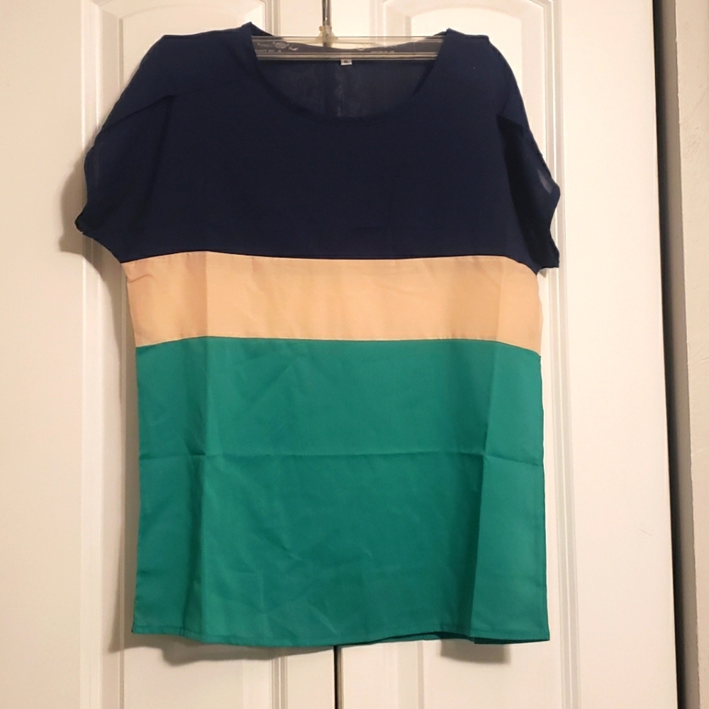 Colorblock size xl. Navy, tan, green